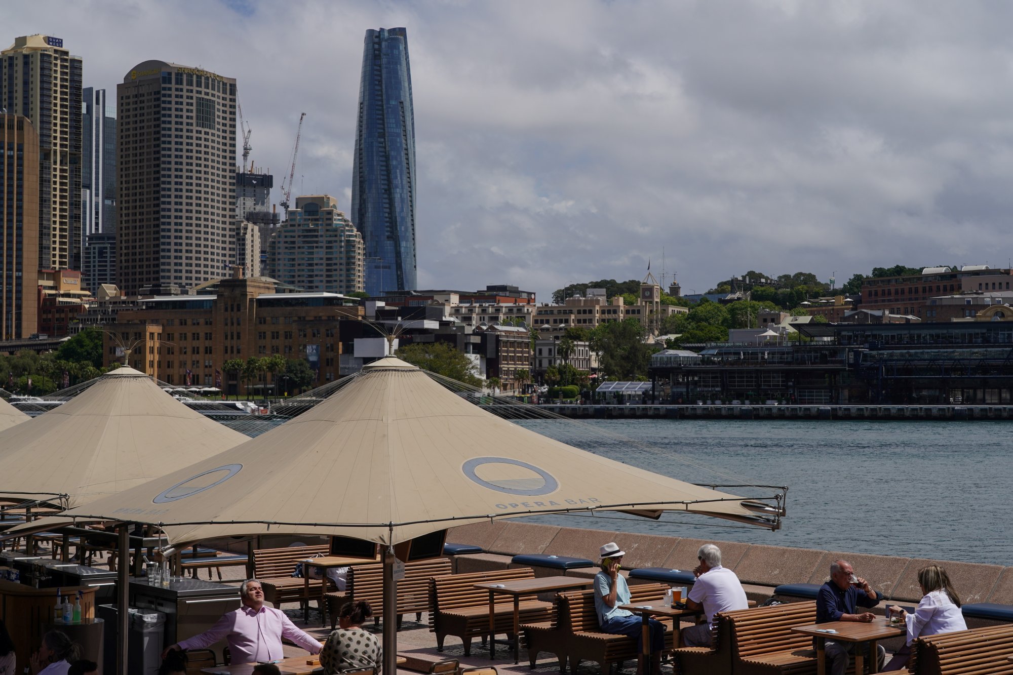 Diners enjoy a meal on the waterfront at Sydney’s Circular Quay. Photo: Reuters