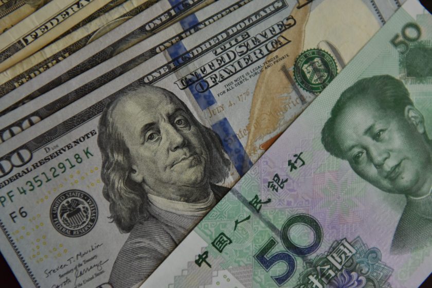 close-up of paper money, the Chinese Yuan And U.S. Dollar