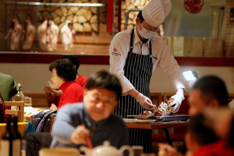 China services activity rises more than expected in Dec- Caixin PMI