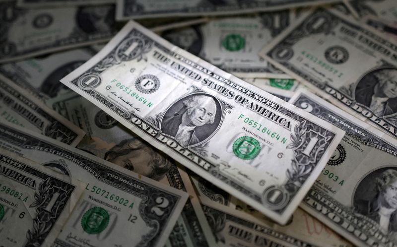 Dollar steady as traders weigh economic data, yen fragile