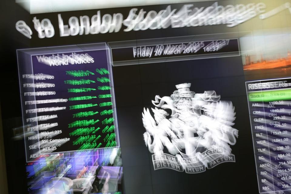 An information screen displaying the FTSE 100 (Yui Mok/PA) (PA Archive)