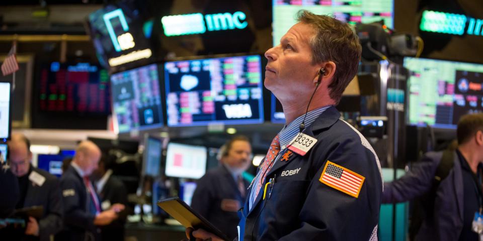 Traders work at the New York Stock Exchange in New York, the United States, March 16, 2020