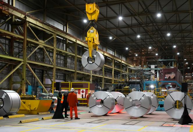 Steel workers at the ArcelorMittal Dofasco steel plant in Hamilton, Ontario, Canada, on March 12, 2025.