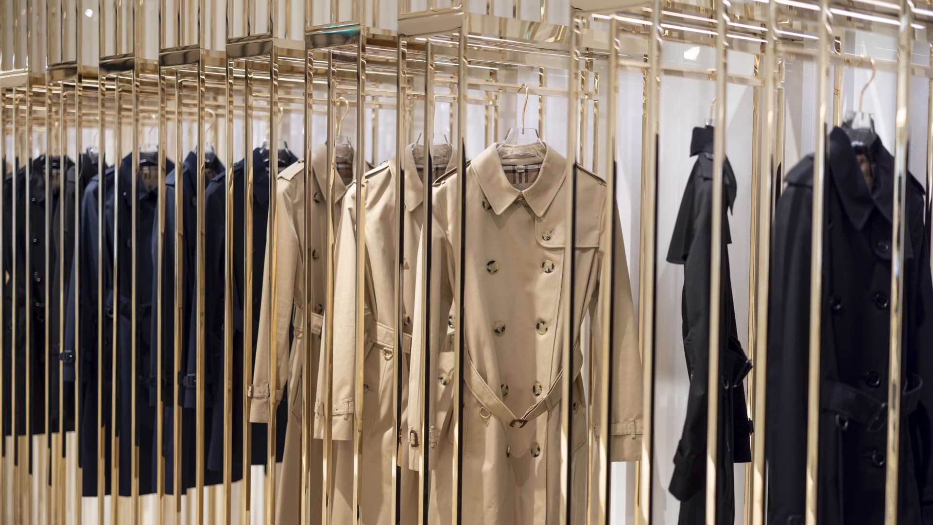 Trench coats on display in a Burberry store on Bond Street in London on Sept. 15, 2023.