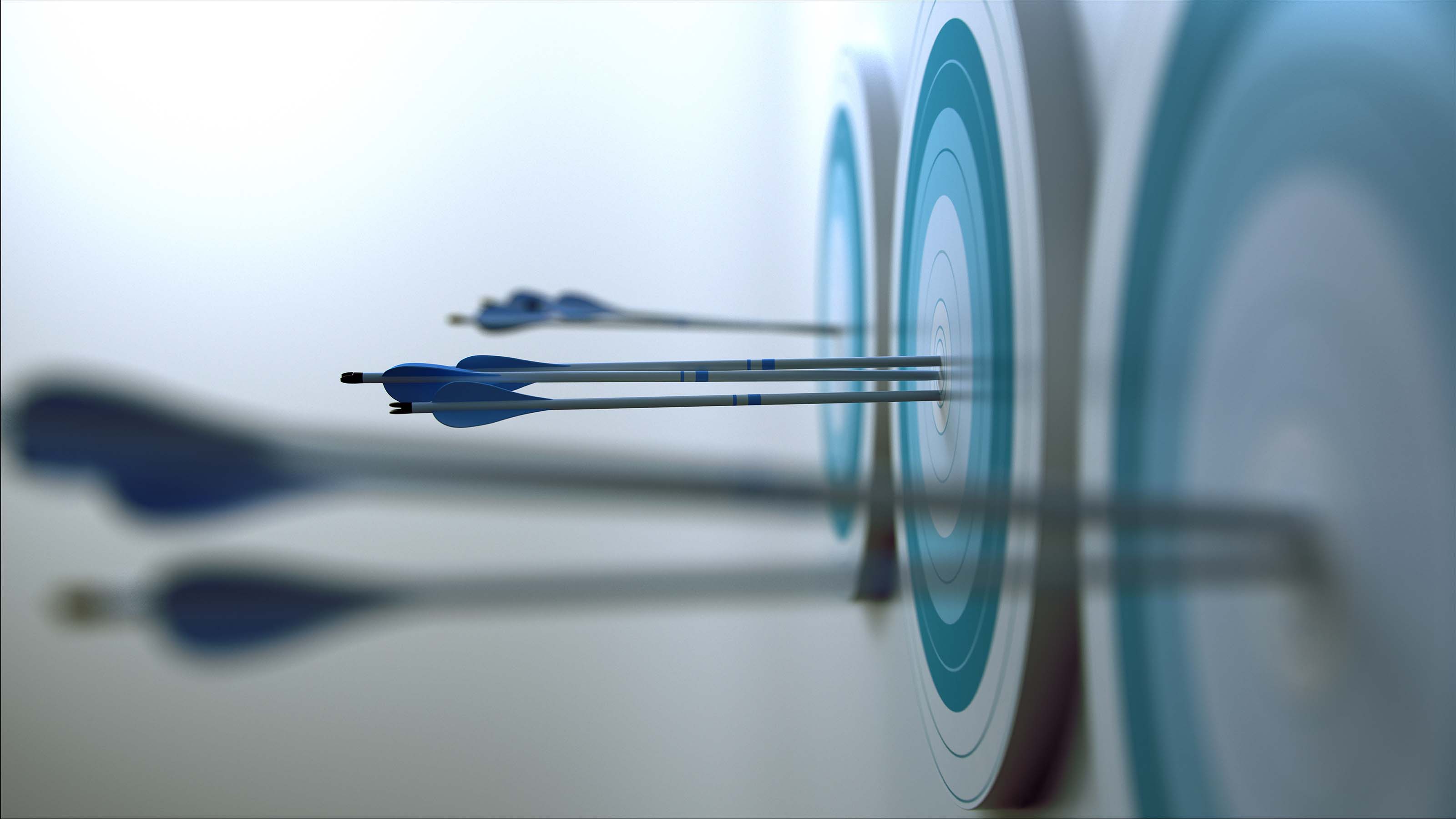 arrows in bullseye of dartboard
