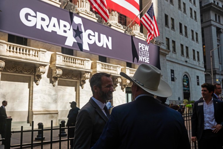 A banner for Texas-based firearm e-commerce platform GrabAGun hangs at the New York Stock Exchange after the company went public on July 16, 2025.