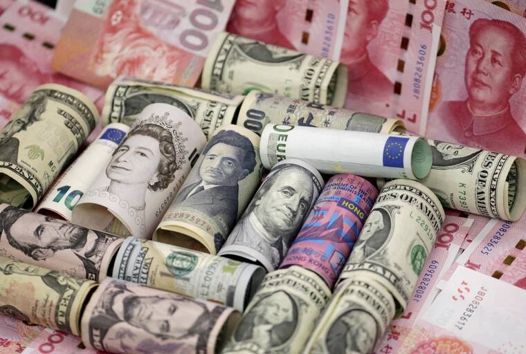 REUTERS/JASON LEE/FILE PHOTO/FILE PHOTO/FILE PHOTO
                                Euro, Hong Kong dollar, U.S. dollar, yen, pound and Chinese 100 yuan banknotes are seen in this picture illustration, in Beijing, China, in January 2016. The yen gained against the dollar and euro today in choppy trading as investors weighed speculation about Prime Minister Shigeru Ishibas future against U.S. President Donald Trumps announcement of a trade deal with the worlds fifth-largest economy.