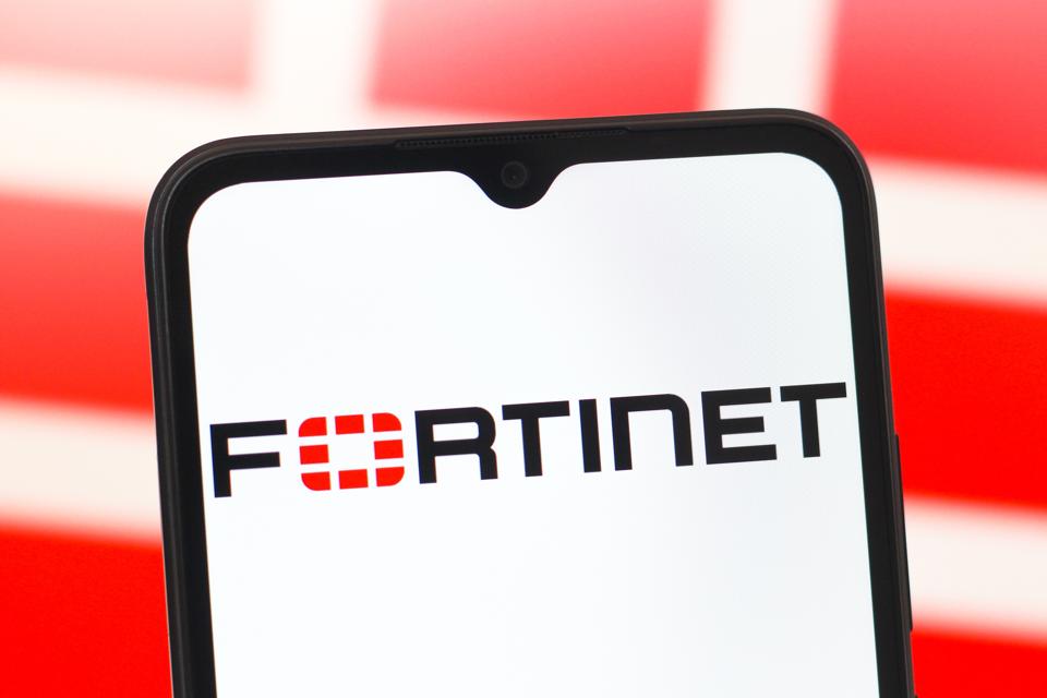 In this photo illustration, the Fortinet, Inc. logo is seen...