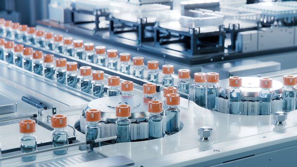 A production line with medication bottles.