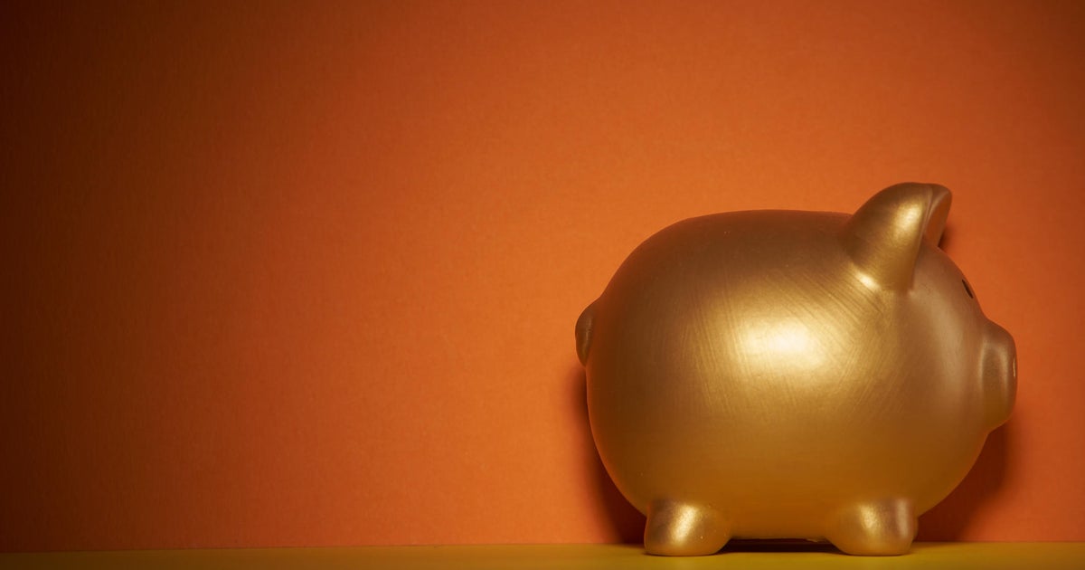 gold colored piggy bank 