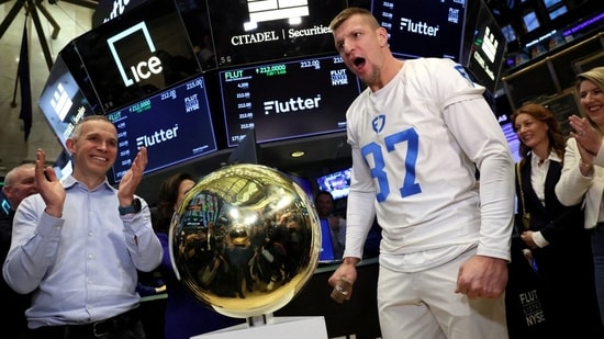 Peter Jackson, CEO of the parent of FanDuel, and former NFL star Rob Gronkowski in January 2024, when the company was listed on the New York Stock Exchange. Peter Jackson, CEO of the parent of FanDuel, and former NFL star Rob Gronkowski in January 2024, when the company was listed on the New York Stock Exchange.