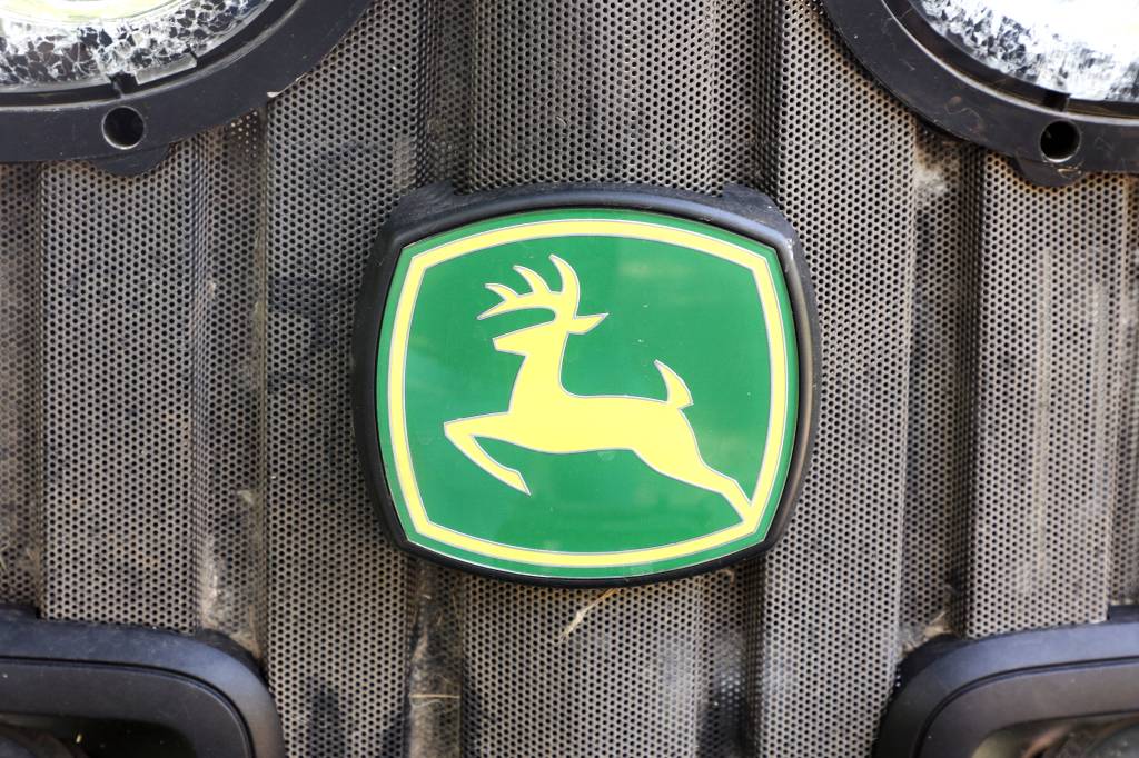 John Deere logo on a tractor.