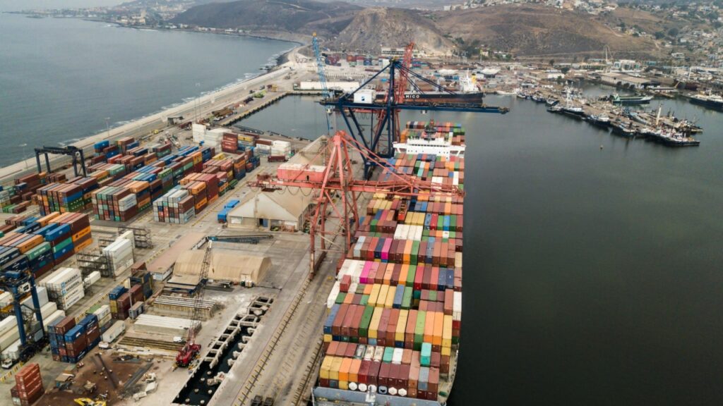 Container ship docks in Mexico port.