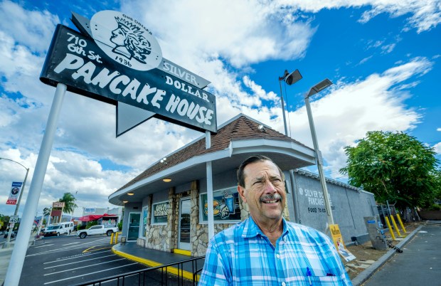 Mark Fogel owns the Silver Dollar Pancake House building and...