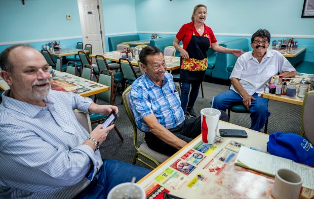From left, Wes Speake, Mark Fogel, Diana Hernandez, and Robert...