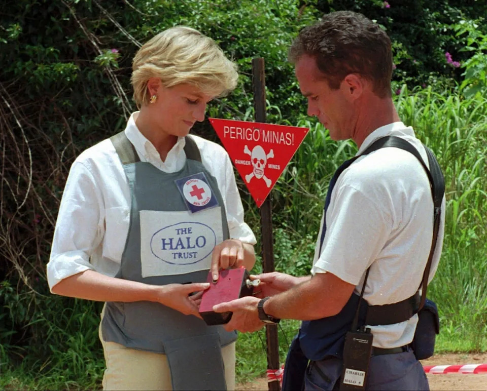 Princess Diana put the charity in the spotlight when she walked through a live landmine field in Angola, months before her death. (AP)