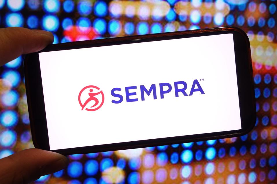 In this photo illustration, the Sempra Energy company logo...