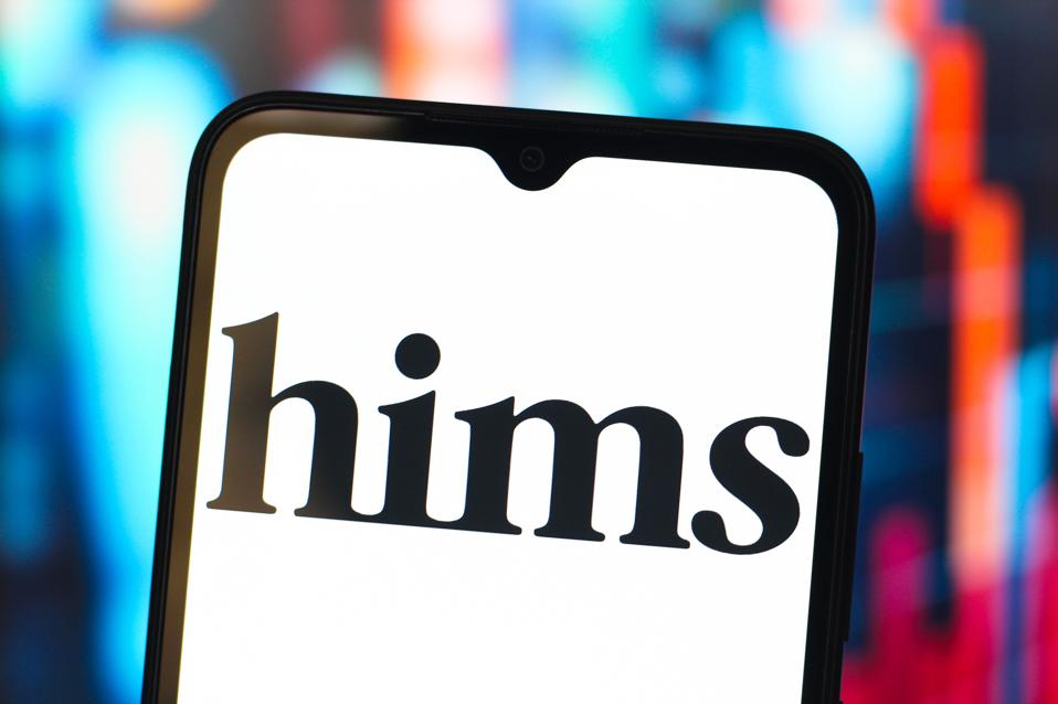In this photo illustration, the Hims & Hers Health logo is...