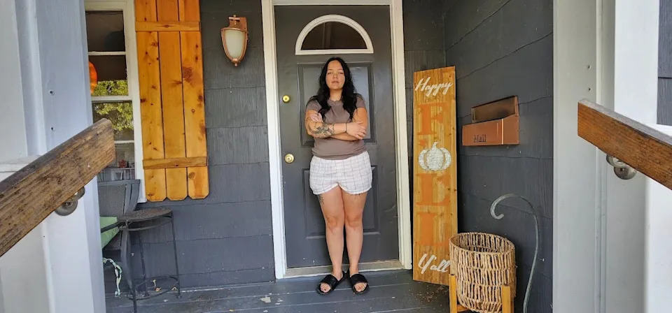 Kirstyn Hahn, who lives behind the site of the My Way Trading Warehouse fire on April 11, 2023, said she was displaced for two weeks, along with her boyfriend, then-6-month-old daughter, four cats and dog.