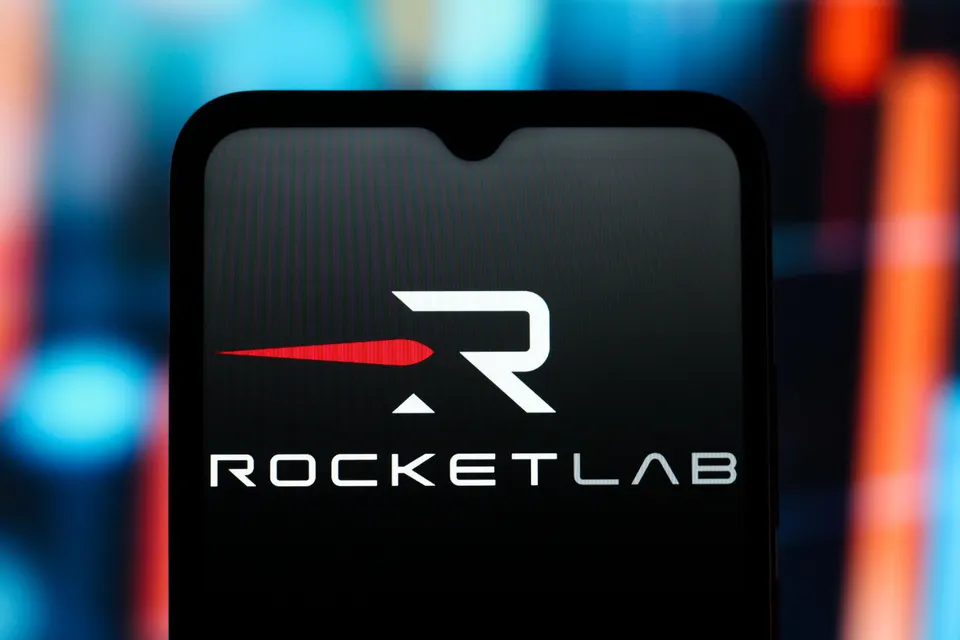 In this photo illustration, the Rocket Lab logo is seen...