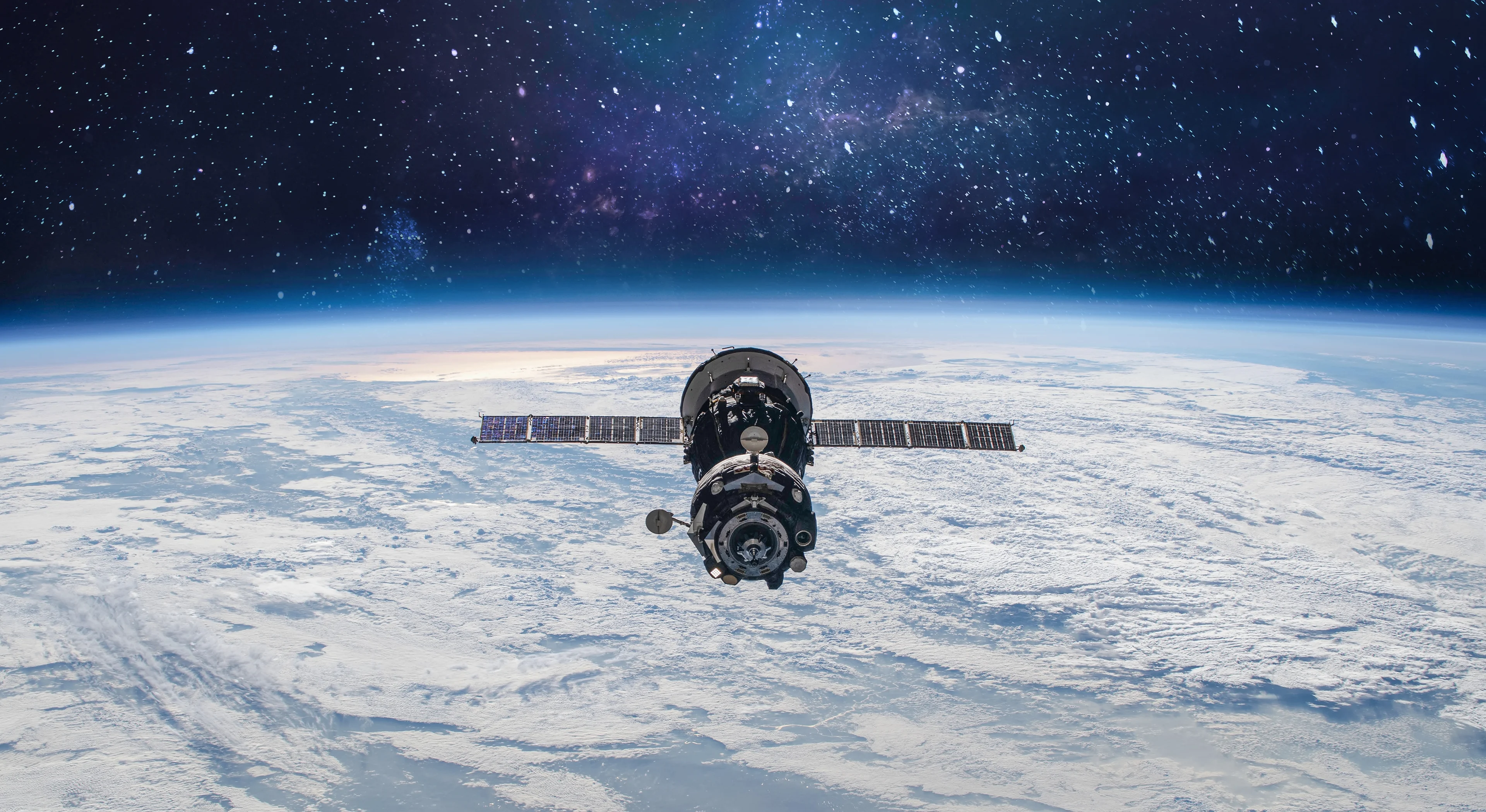 A satellite flying above earth.