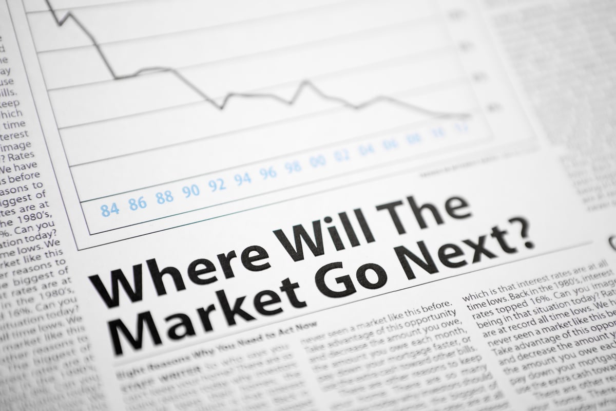 A newspaper with a stock chart and a headline reading Where Will The Market Go Next?