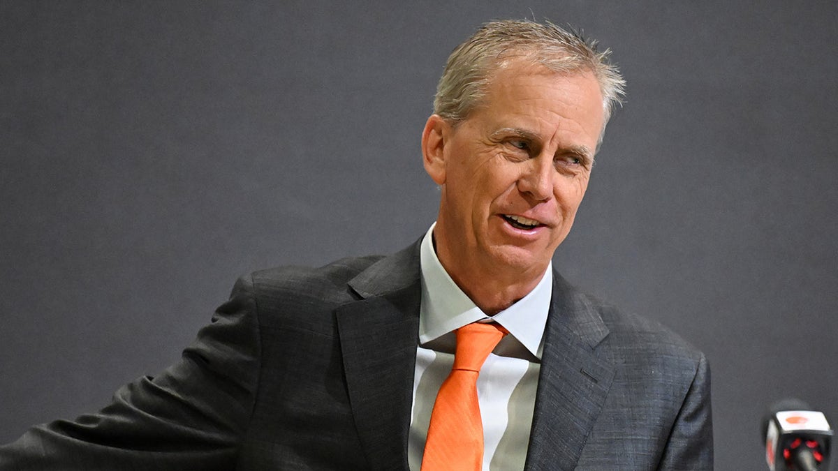 Todd Monken looks on